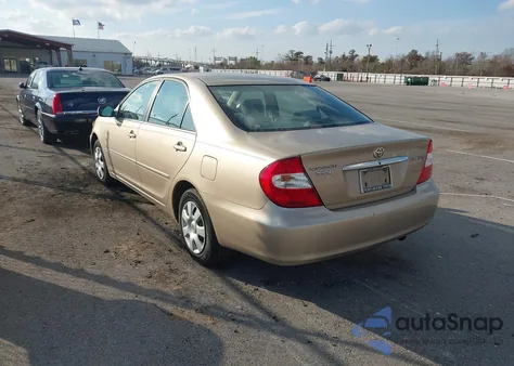 2002 Toyota Camry Le from USA, damaged, VIN 4T1BE32K22U078507